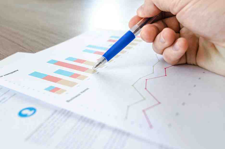 Safe investment strategies and low financial risk money-making tips with financial charts.