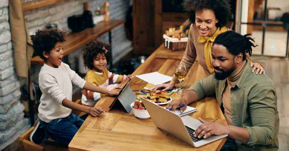 Modern family using technology and learning tools together during the holidays