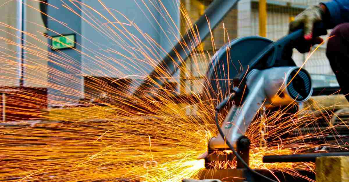 Technician inspecting a manway tank in a harsh industrial environment