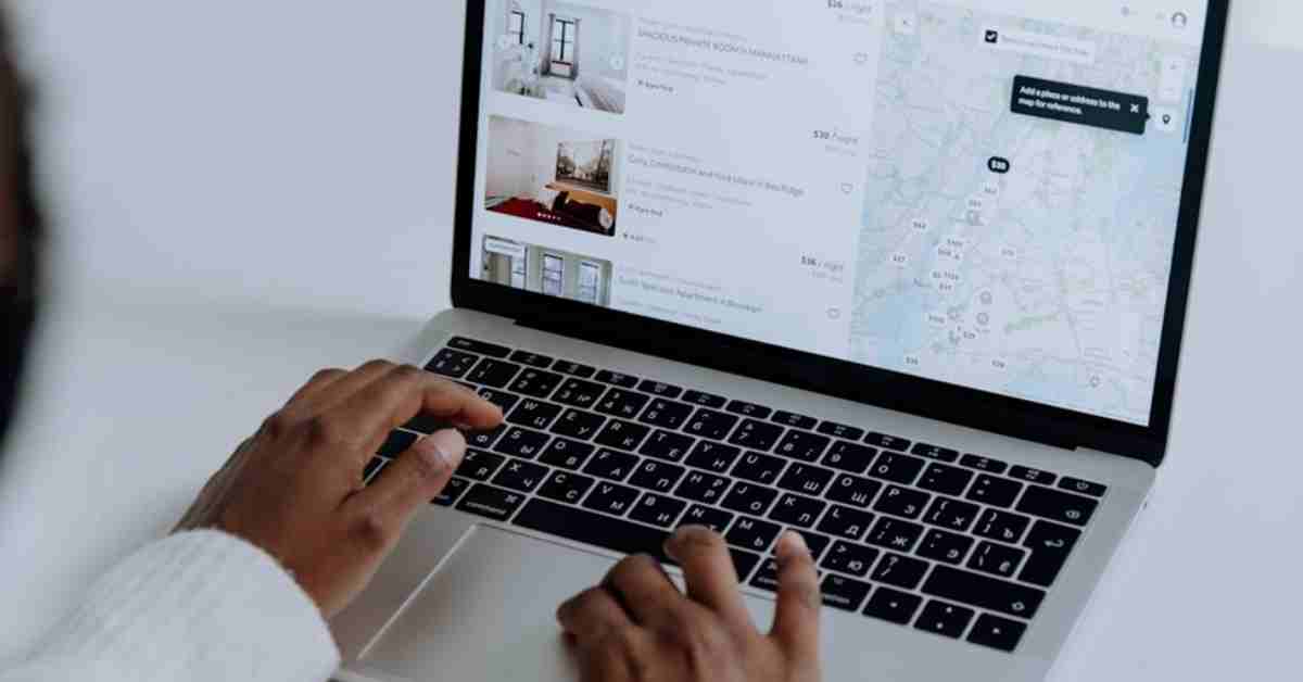 A clean, modern workspace featuring a laptop displaying a growing search traffic graph, representing effective SEO strategies.